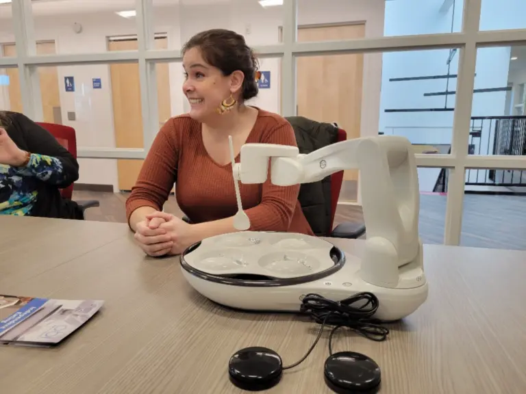 Obi excited about a robotic arm