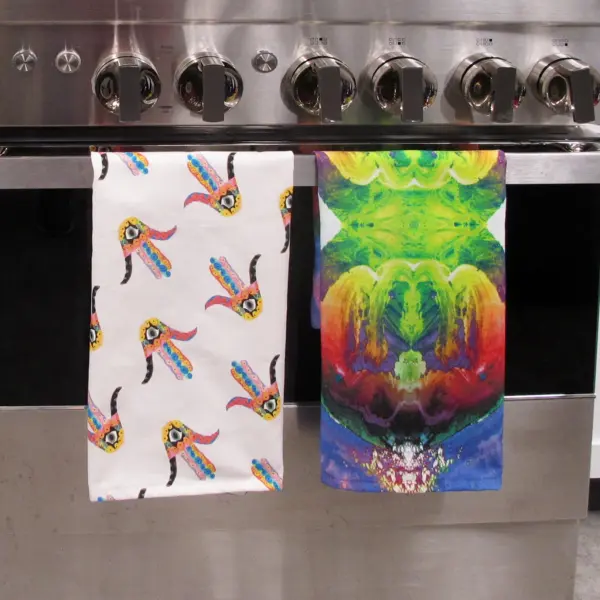 Tea Towels hanging off an oven handle