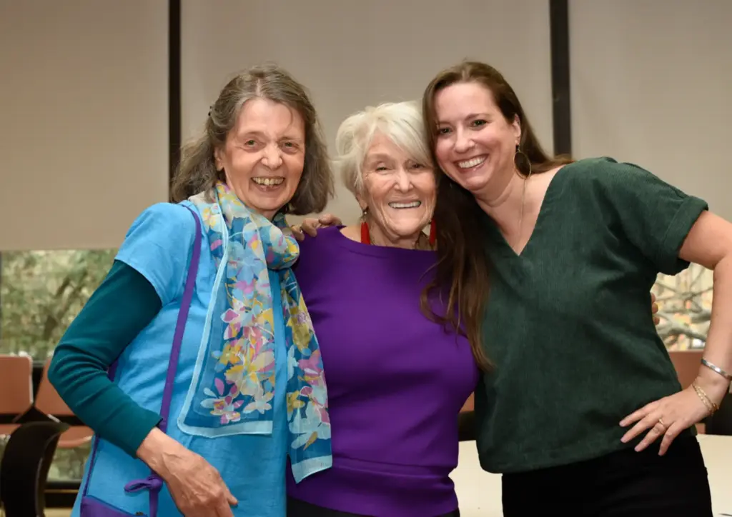 Esther and Lisette celebrating with Marilynn Schneider